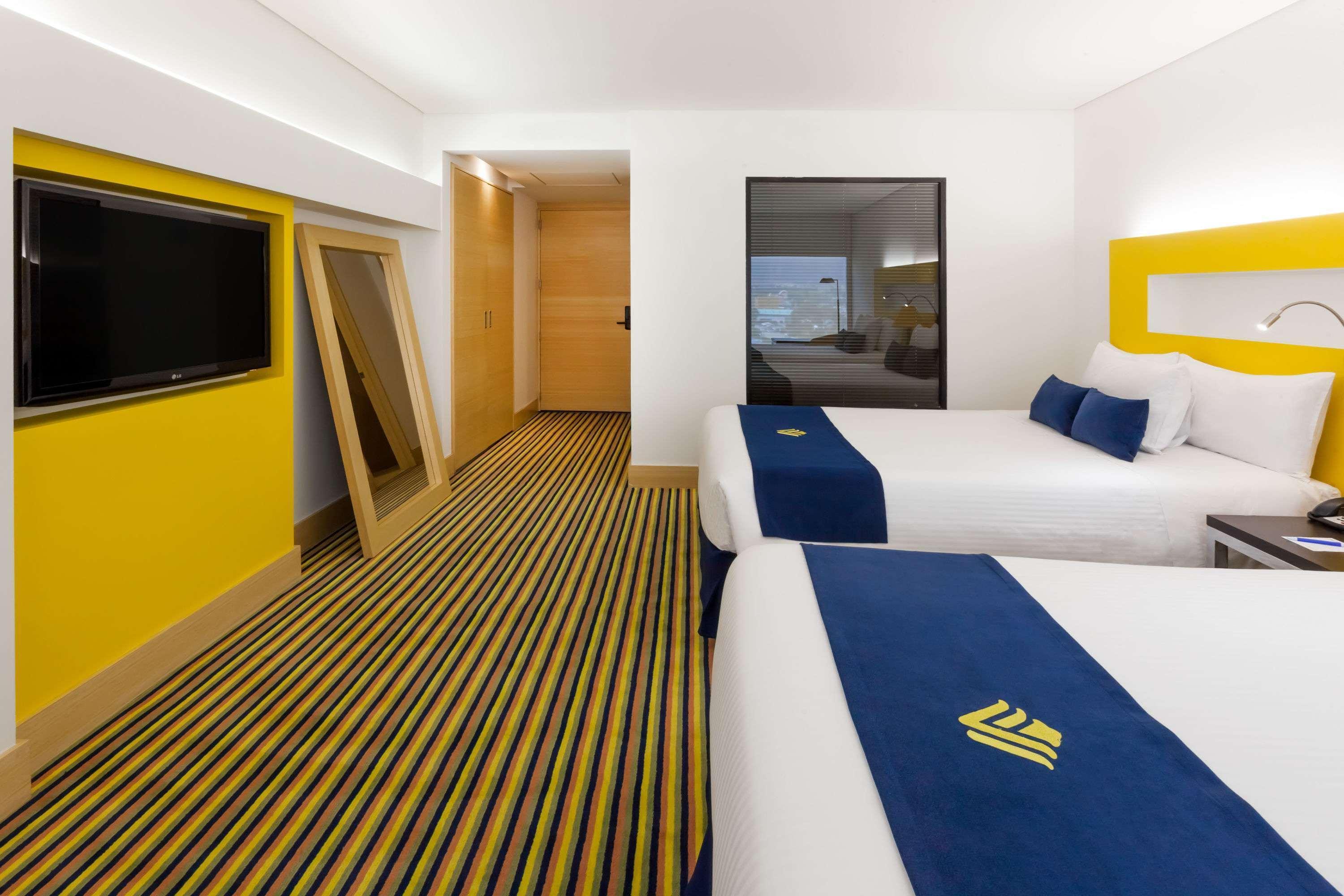 Hotel Wyndham Bogotá Zewnętrze zdjęcie A room at the hotel